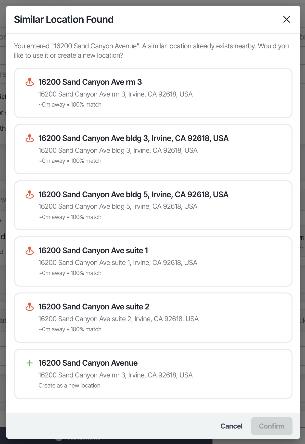 Nearby Location Picker modal showing suite-sibling candidates at the same street address